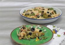 Oven-baked cauliflower, broccoli, olives and cheese
