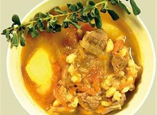 Beefy vegetable soup with herbs